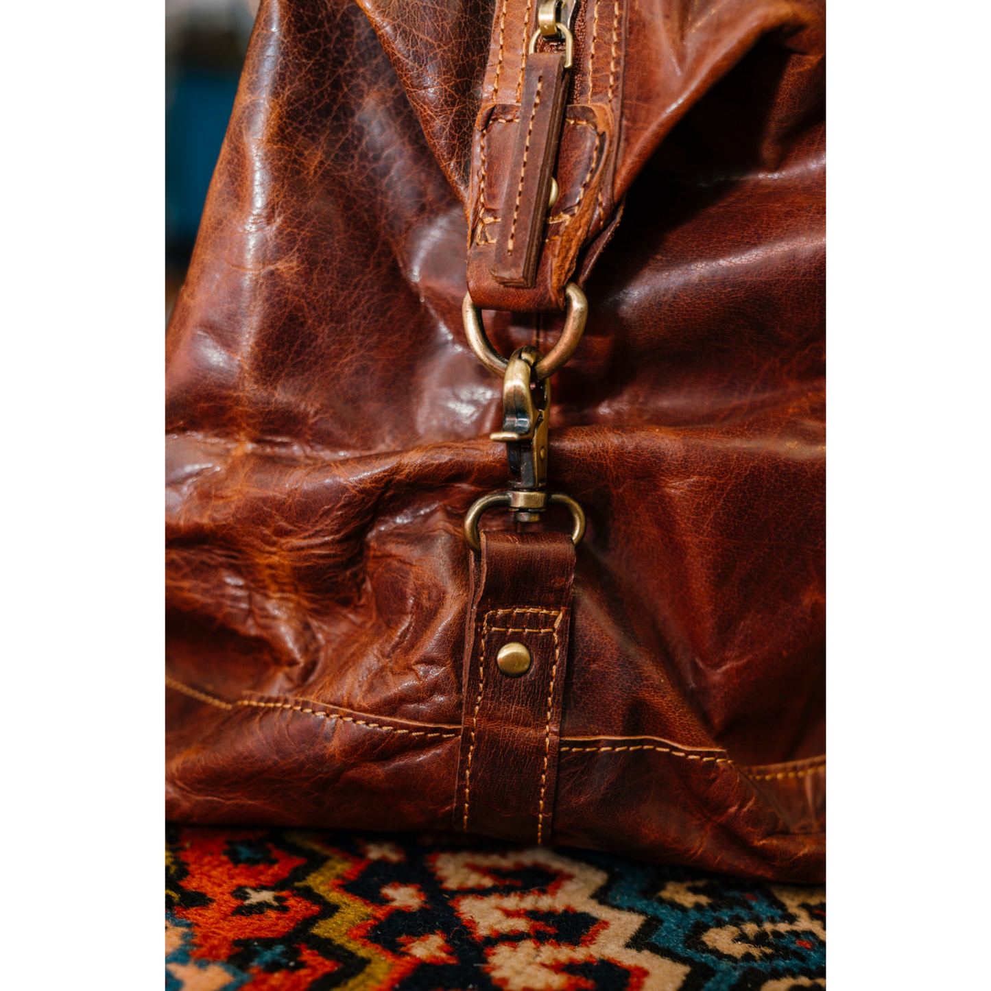 Buck Off Leather Duffel Bag