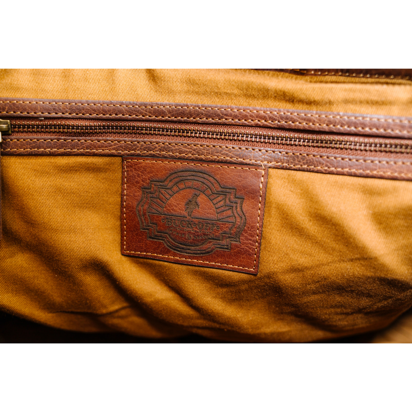 Buck Off Leather Duffel Bag